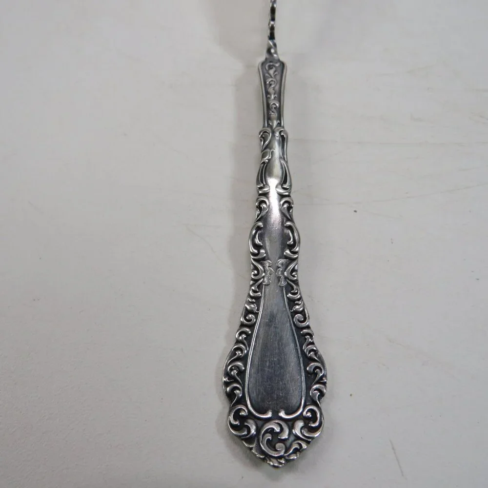 Webster Twisted Handle Butter Knife silver plated S.L. & G.H. Rogers Company A1